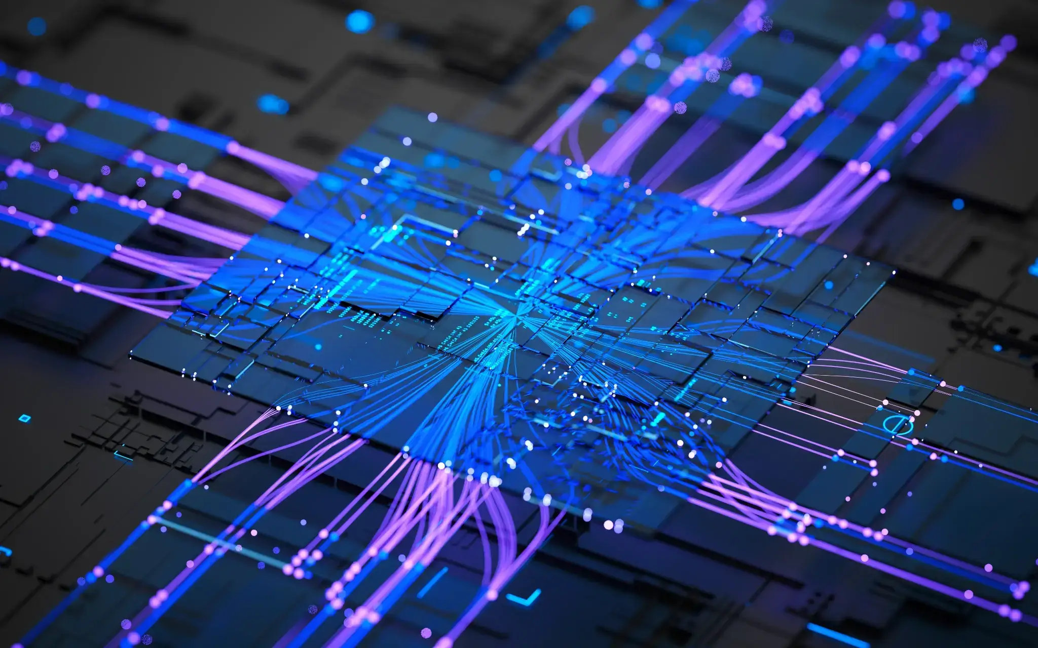 Two engineers working together to adjust an industrial robotic system